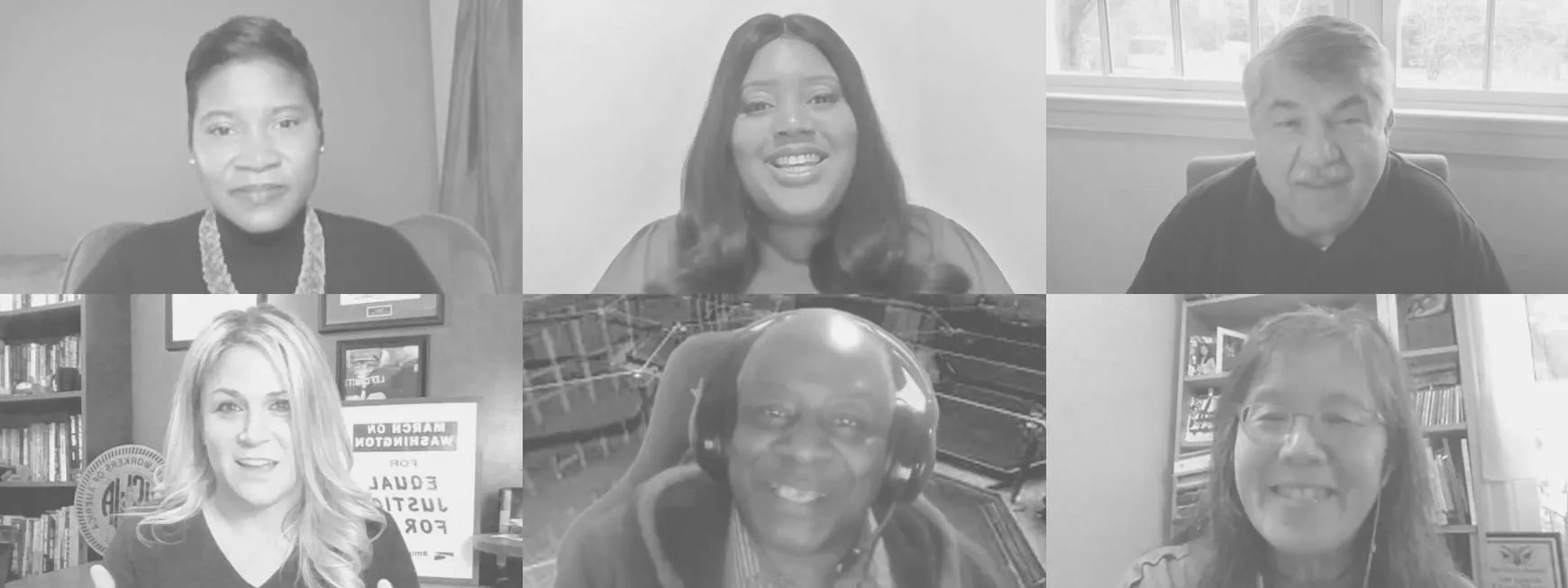 Six conference speakers on camera during a panel, in black and white