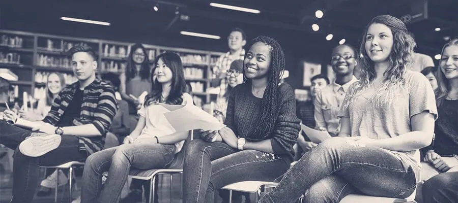 Students seated together in a library