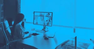 Going Green Events: Sustainable Ideas for Your Next Event Person taking a video call at an office desk