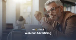 Ads That Work: Upgrading Your Webinar Advertising Approach A man sitting at a table with the words webinar advertising.