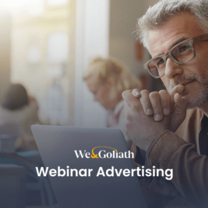 A man sitting at a table with the words webinar advertising.