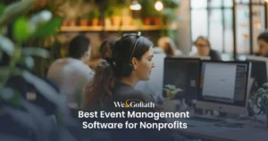 The Best Event Management Software for Nonprofits in 2024 A woman wearing headphones and looking at a computer.