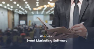 Top Event Marketing Software Picks for Market Success A man in a suit is holding a notebook with the words event marketing software.