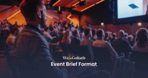 Event Brief Format Guide: Plan Your Event Like a Pro Audience listening to a presentation at a corporate event.