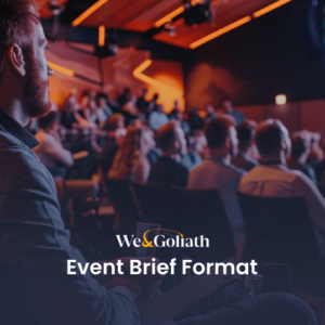 Event Brief Format Guide: Plan Your Event Like a Pro Audience listening to a presentation at a corporate event.