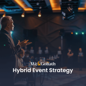 Hybrid Event Strategy: 2024 Guide for Event Marketers Speaker presenting at a hybrid event conference.