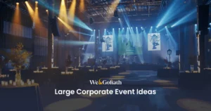9 Extravagant Large Corporate Event Ideas for Big Budgets Corporate event venue with stage setup and banquet tables under blue lighting.