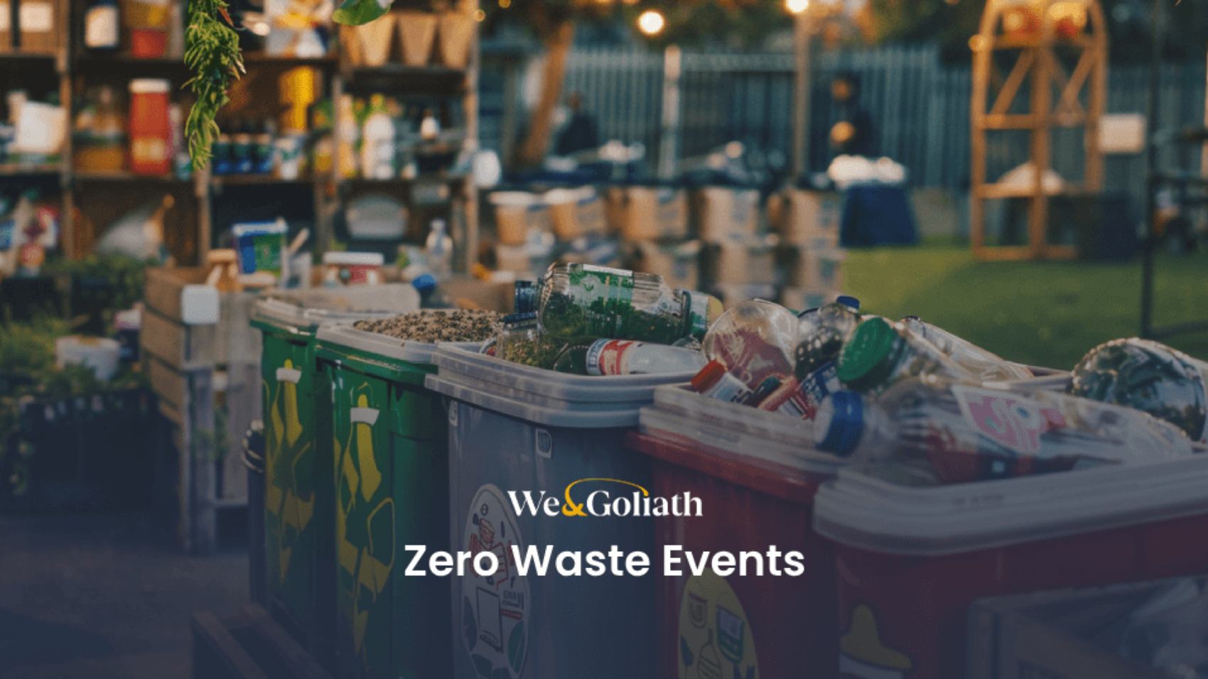 Color-coded recycling bins lined up at an outdoor event with the text "zero waste events".