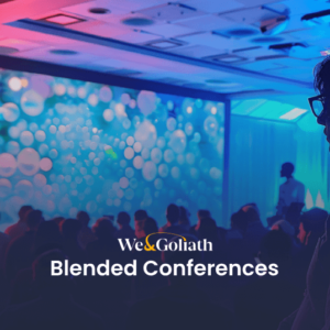 Blended Conference Experience: Live, Interactive, and Engaging Audience engaged in a presentation at a blended conference event.