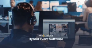 Hybrid Event Software: Cost-Effective Solution for Modern Events A man with headphones working at a computer in an office environment with text overlay about hybrid event software.