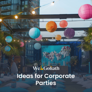 Colorful lanterns decorate an outdoor corporate event venue at dusk.