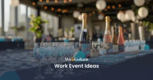 Uplifting Work Event Ideas for a Positive Work Culture Elegant corporate event setup with champagne glasses and appetizers on a table, with "work event ideas" text overlay.