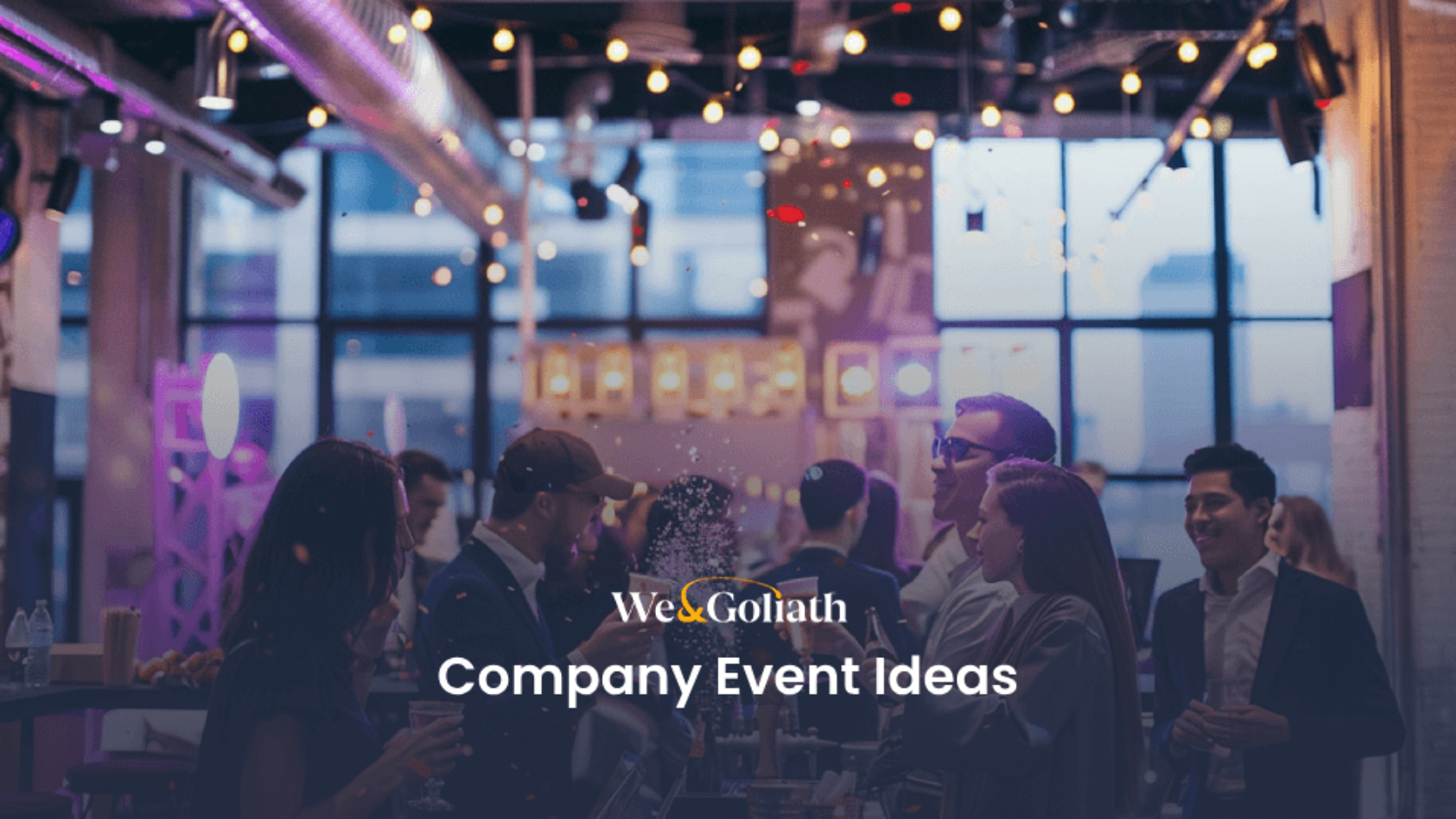 Group of professionals networking at an indoor company event with ambient lighting and modern decor.