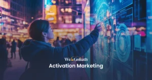 Understanding Brand Activation We and Goliath cover for activation marketing, showing a person touching a neon display
