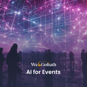 AI for Events: Boosting Efficiency and Engagement Silhouettes of people stand in front of a large LED display with geometric patterns and the text "We & Goliath AI for Events.