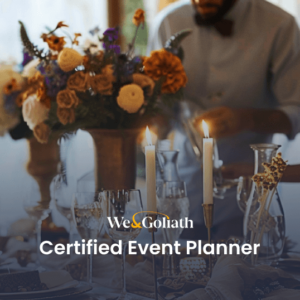 A man and a woman stand by a table set with flowers, candles, and glasses, arranging items. Text overlay reads "We & Goliath Certified Event Planner.