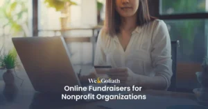 Online Fundraising: Ideas for Nonprofits A person holding a credit card sits at a desk with a laptop. Overlay text reads, "We & Goliath Online Fundraisers for Nonprofit Organizations.
