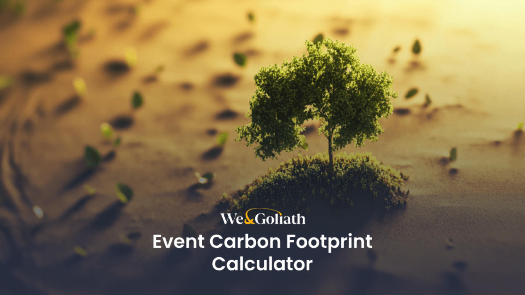 A small tree growing on a patch of grass in a barren landscape. Text reads "We & Goliath Event Carbon Footprint Calculator.