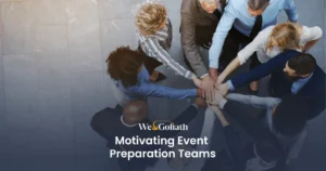 Inspiring Event Planning Teams: Strategies for Success We and Goliath cover for motivating event preparation teams, showing hands in a team huddle