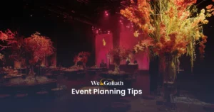 Event Planning Strategies and Best Practices We and Goliath cover for event planning tips, showing an event space with autumnal florals