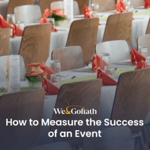 Evaluating Event Effectiveness: Metrics and Insights Rows of tables set for an event with charming flowers, elegant menus, and neatly folded napkins create the perfect setting. Explore "How to Measure the Success of an Event" to ensure every detail contributes to an unforgettable experience.
