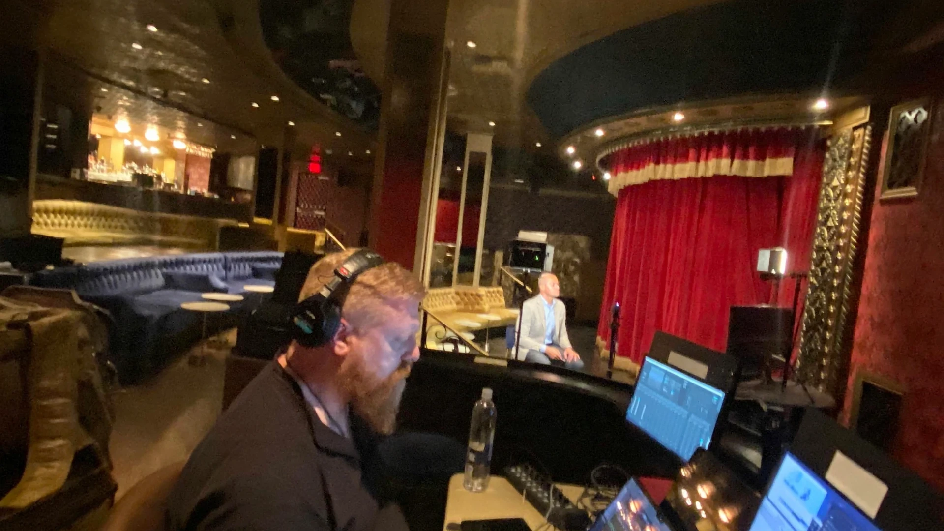 We & Goliath at a live TaxAct event, running the production desk during a stage presentation